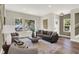 Open living room with ample natural light and stylish furnishings at 1647 Sheldon St, Indianapolis, IN 46218