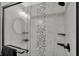 Walk-in shower with marble tile and mosaic accents at 1647 Sheldon St, Indianapolis, IN 46218