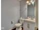 Half bathroom features a single sink vanity and a toilet at 2225 Shadowbrook Dr, Plainfield, IN 46168