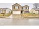 Charming two-story brick home with black shutters and attached two-car garage at 2225 Shadowbrook Dr, Plainfield, IN 46168