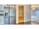 View from kitchen featuring walk-in pantry with wire shelving and stainless steel refrigerator at 2225 Shadowbrook Dr, Plainfield, IN 46168