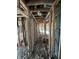 Hallway displaying exposed studs and wiring, ready to be renovated into a modern living space at 4026 W 141St St, Carmel, IN 46074