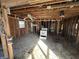 Bright living area features exposed beams, ceiling fan, and natural light, presenting a unique remodeling opportunity at 4026 W 141St St, Carmel, IN 46074