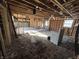 Spacious living room with exposed framing and subflooring, awaiting transformation and customization at 4026 W 141St St, Carmel, IN 46074