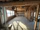 Expansive living area with large windows, showcasing an open layout ready for customization and transformation at 4026 W 141St St, Carmel, IN 46074