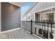Spacious balcony showing views of the neighboring gray townhomes at 5743 Cr W 750 N, McCordsville, IN 46055