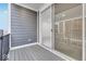 Cozy outdoor balcony with gray composite decking and gray siding at 5743 Cr W 750 N, McCordsville, IN 46055