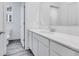 Bathroom with a long vanity, modern mirror, and stylish faucet, offering a serene and functional space at 5743 Cr W 750 N, McCordsville, IN 46055