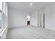 Large bedroom with many windows and neutral carpet at 5743 Cr W 750 N, McCordsville, IN 46055