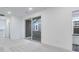 Carpeted bedroom with a sliding door to a balcony and white walls at 5743 Cr W 750 N, McCordsville, IN 46055