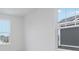 Bright, airy bedroom with large windows offering views of the surrounding neighborhood and blue sky at 5743 Cr W 750 N, McCordsville, IN 46055