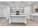 Stylish kitchen with gray cabinets, quartz countertops, and pendant lighting at 5743 Cr W 750 N, McCordsville, IN 46055
