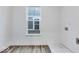 Well-lit laundry room with durable flooring and hookups ready for washer and dryer installation at 5743 Cr W 750 N, McCordsville, IN 46055