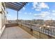 Enjoy city views from this spacious balcony with modern metal railings and pergola at 1155 S Rangeline Rd # 503, Carmel, IN 46032