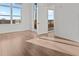 Bright bedroom features large window with view and access to a private balcony at 1155 S Rangeline Rd # 503, Carmel, IN 46032