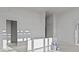 Spacious, well-lit living room with unfinished walls, offering a blank canvas for your personal touch at 1155 S Rangeline Rd # 503, Carmel, IN 46032