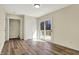 Bedroom features wood floors, closet, sliding glass door and access to the laundry room at 7635 Grizzly Dr, Nineveh, IN 46164
