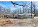 Charming ranch-style home featuring neutral siding, a covered entryway, and a well-maintained front yard on a sunny day at 7635 Grizzly Dr, Nineveh, IN 46164