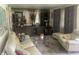 Relaxing living room with comfortable seating, a glass coffee table, and stylish decor at 6438 Doris Dr, Indianapolis, IN 46214