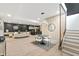 Finished basement with an open layout, bar seating, and cozy living area at 9700 Windy Hills Dr, Zionsville, IN 46077