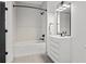 Modern bathroom with white subway tile, dark fixtures, and a sleek white vanity at 9700 Windy Hills Dr, Zionsville, IN 46077