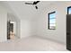 Bright bedroom with a ceiling fan and a view of the interior hallway at 9700 Windy Hills Dr, Zionsville, IN 46077