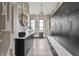 Hallway with custom shelving, desk, and modern decor at 9700 Windy Hills Dr, Zionsville, IN 46077