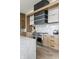 Close-up of a kitchen with stainless steel oven and range, and marbled countertops at 9700 Windy Hills Dr, Zionsville, IN 46077