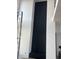 Modern wall with a dark accent stretching from the floor to the ceiling and decorative stones at 9700 Windy Hills Dr, Zionsville, IN 46077