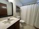 Clean bathroom with shower/tub, vanity, and toilet at 1144 Woodridge, Brownsburg, IN 46112