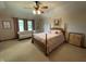 Spacious bedroom with a large bed, sitting area and ample closet space at 1144 Woodridge, Brownsburg, IN 46112