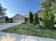 Ranch style brick home with attached 2-car garage at 1144 Woodridge, Brownsburg, IN 46112