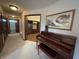Elegant hallway with piano, access to other rooms and ample space at 1144 Woodridge, Brownsburg, IN 46112