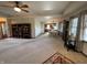 Open concept living and dining area with kitchen access at 1144 Woodridge, Brownsburg, IN 46112