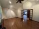 Spacious living room with hardwood floors and French doors at 1144 Woodridge, Brownsburg, IN 46112