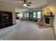 Open living room with view into kitchen and dining area at 1144 Woodridge, Brownsburg, IN 46112