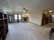 Spacious living room with fireplace, built-in shelving, and hardwood floors at 1144 Woodridge, Brownsburg, IN 46112