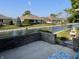 Tranquil water view from backyard with lush landscaping at 1144 Woodridge, Brownsburg, IN 46112