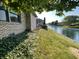 Serene water view of canal and neighboring homes at 1144 Woodridge, Brownsburg, IN 46112