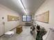 Handy workshop with pegboard walls and ample storage at 1144 Woodridge, Brownsburg, IN 46112