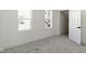 A simple bedroom with two windows and neutral carpeting at 2936 N New Jersey St, Indianapolis, IN 46205