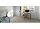 A bright bedroom with a work desk by the window offering plenty of natural light at 2936 N New Jersey St, Indianapolis, IN 46205