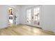 Bright entryway with double glass doors to backyard with view of living room at 2936 N New Jersey St, Indianapolis, IN 46205