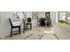 Inviting living room with a stylish bar area, plush seating, and elegant rug at 2936 N New Jersey St, Indianapolis, IN 46205