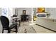 Living room featuring a bar area, comfortable seating, and fireplace in the background at 2936 N New Jersey St, Indianapolis, IN 46205