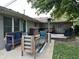 Relaxing back patio with comfortable seating, bar, and a grill for outdoor dining at 105 Tulip Dr, Indianapolis, IN 46227