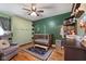 Bedroom with wood-paneled crib and built in storage and shelving at 105 Tulip Dr, Indianapolis, IN 46227