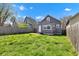 Backyard featuring fenced in yard with a small outdoor patio at 2137 Ringgold Ave, Indianapolis, IN 46203