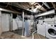 This unfinished basement features plumbing for laundry machines at 2137 Ringgold Ave, Indianapolis, IN 46203