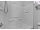 This bathroom features a tub with white tile and modern fixtures at 2137 Ringgold Ave, Indianapolis, IN 46203